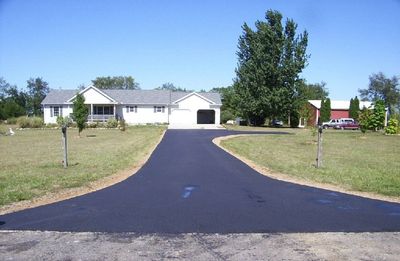 Residential Asphalt Driveway Maintenance — Battle Creek, MI — Damron Brother’s Asphalt Residential Asphalt Driveway Maintenance — Battle Creek, MI — Damron Brother’s Asphalt