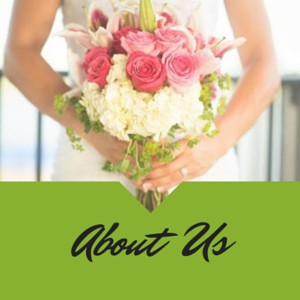 Person holding a pink-and-white bouquet above a green banner reading “About Us”