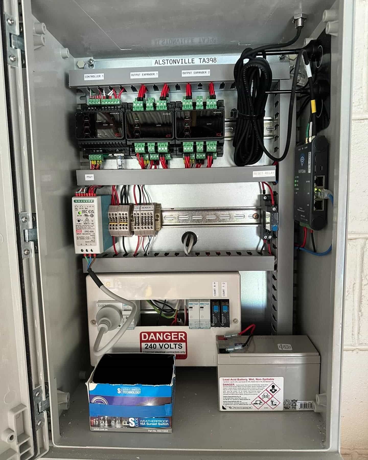 The Inside Of A Electrical Box With A Danger Sign On It — Grand Casa Electrical Solar & Batteries In Alstonville, NSW