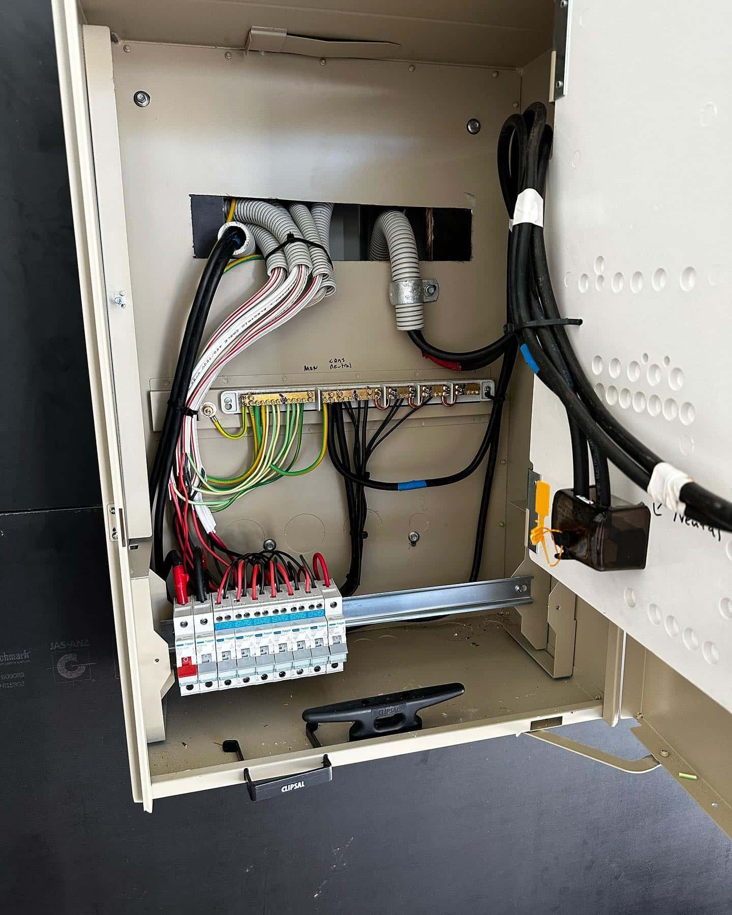 The Inside Of A Electrical Box With A Lot Of Wires Coming Out Of It — Grand Casa Electrical Solar & Batteries In Casino, NSW