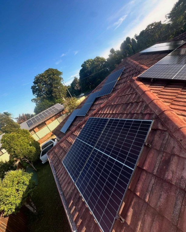 Solar Panels Installed on a Red Tile Roof — Grand Casa Electrical Solar & Batteries In Ballina, NSW