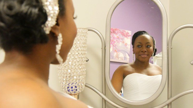 Bride Checking on Mirror | Atlanta, GA | Elegant Occasion Event Center