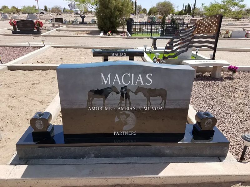 Upright headstone with horse carving