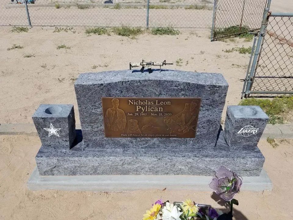 Upright headstone gray and sports carving