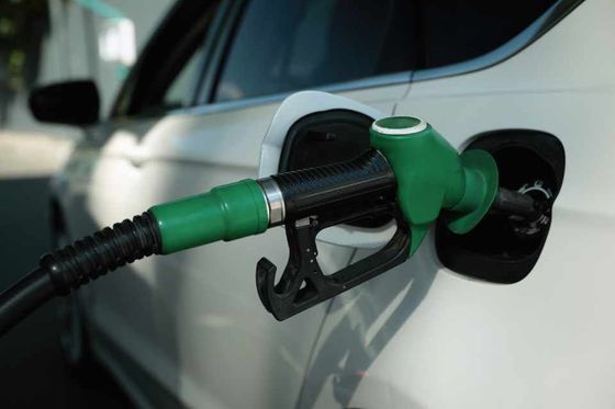 fuel nozzle to refuel. Vehicle fueling facility