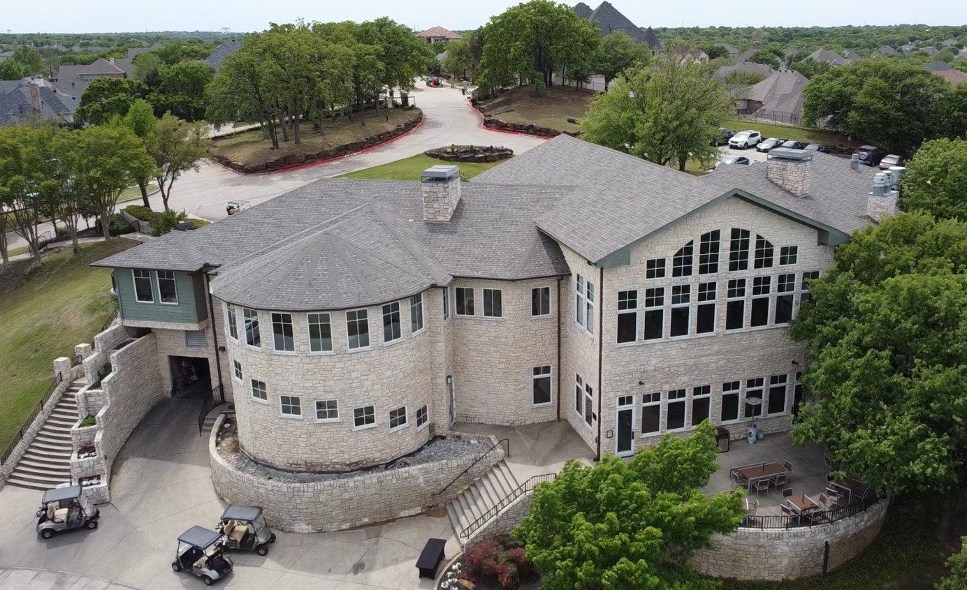 Two Man Working On The Rooftop — Haslet, TX — Super Roofman