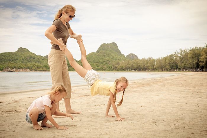 mother with children on a beach