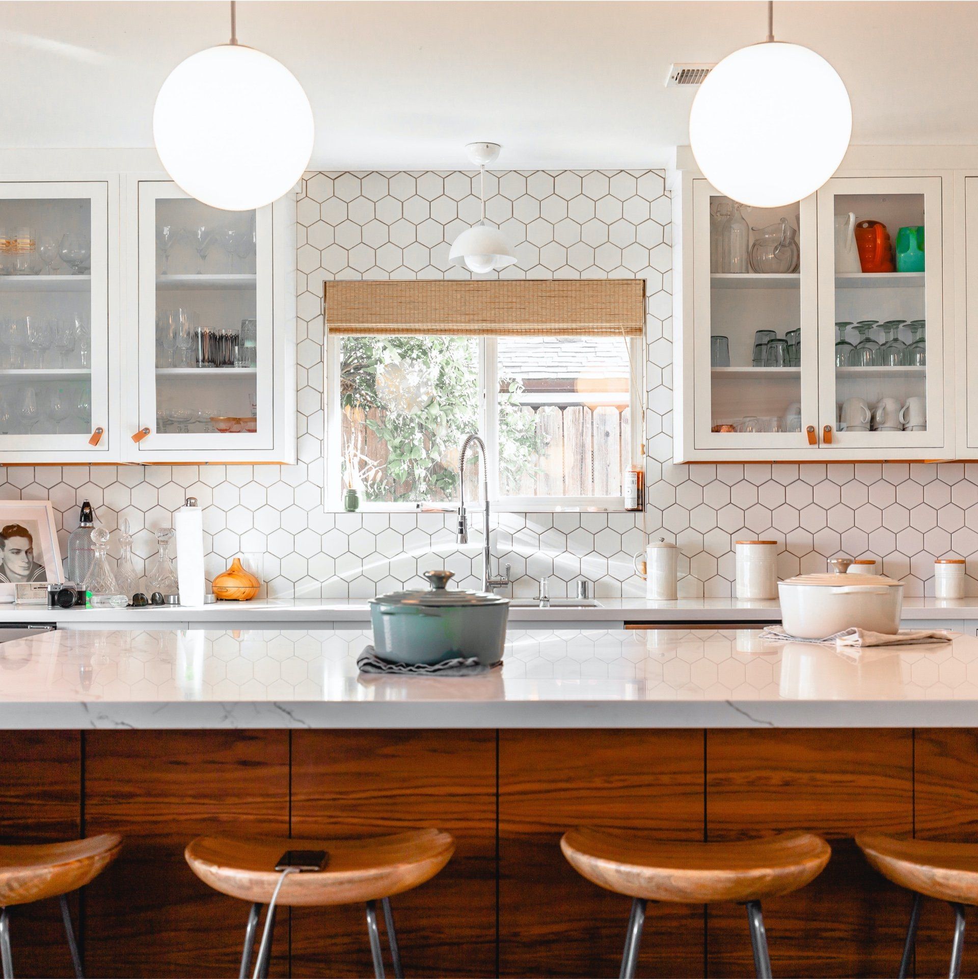 white and pine kitchen with hexagon wall tiles