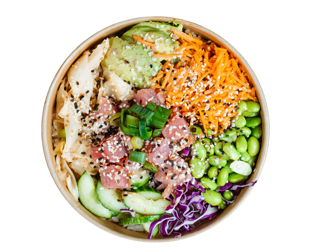 A bowl filled with a variety of vegetables and meat on a white background.