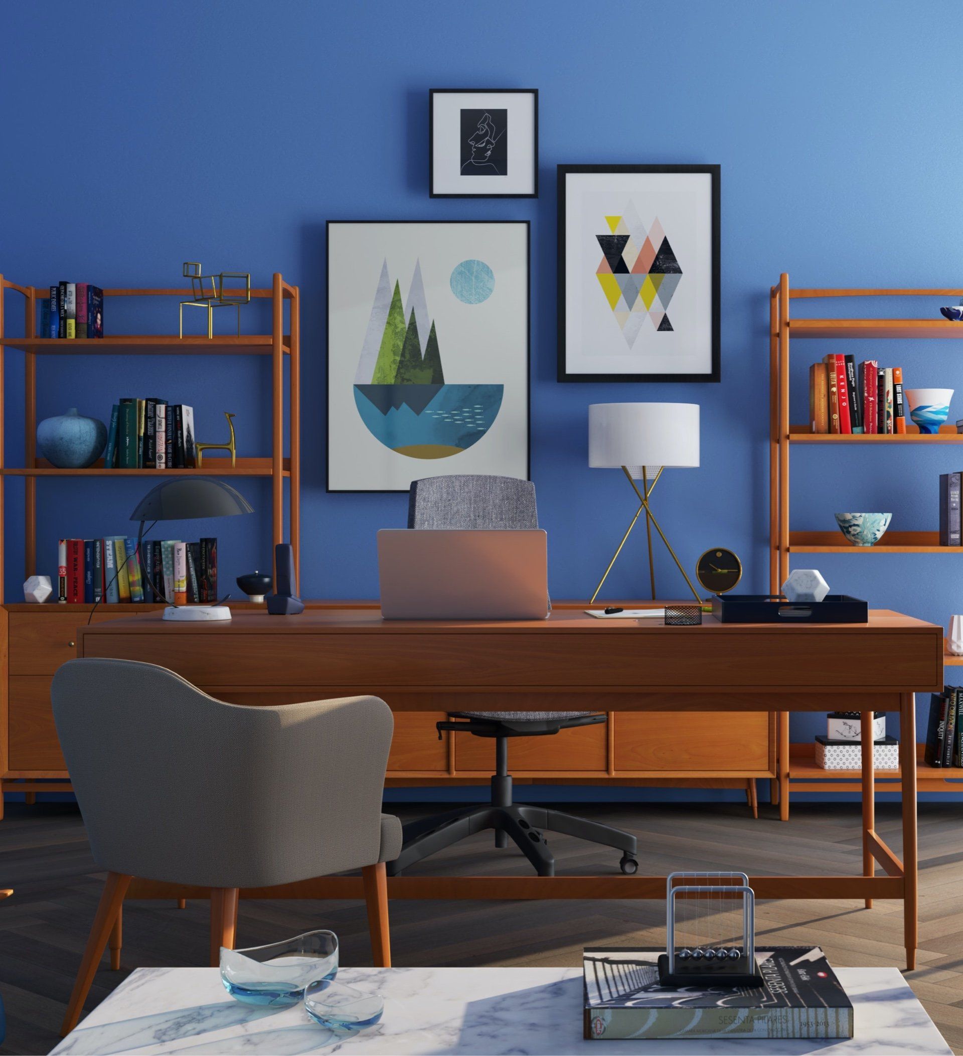 A room with blue walls and a desk with a laptop on it