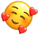 a yellow smiley face with red hearts around it 's eyes .