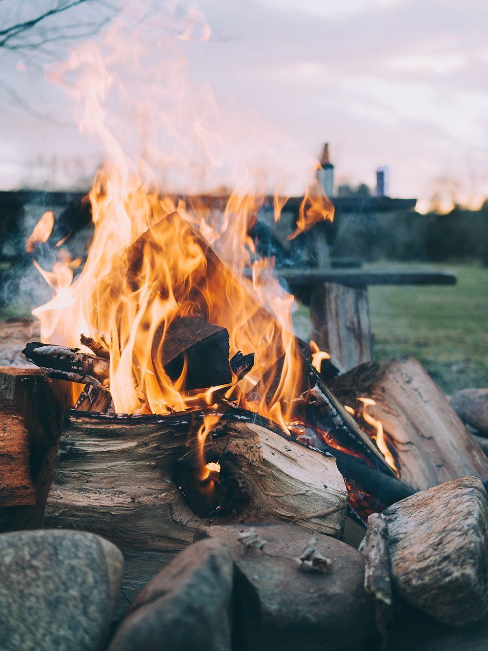 logs in a lit campfire