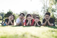 Asian family on the grass