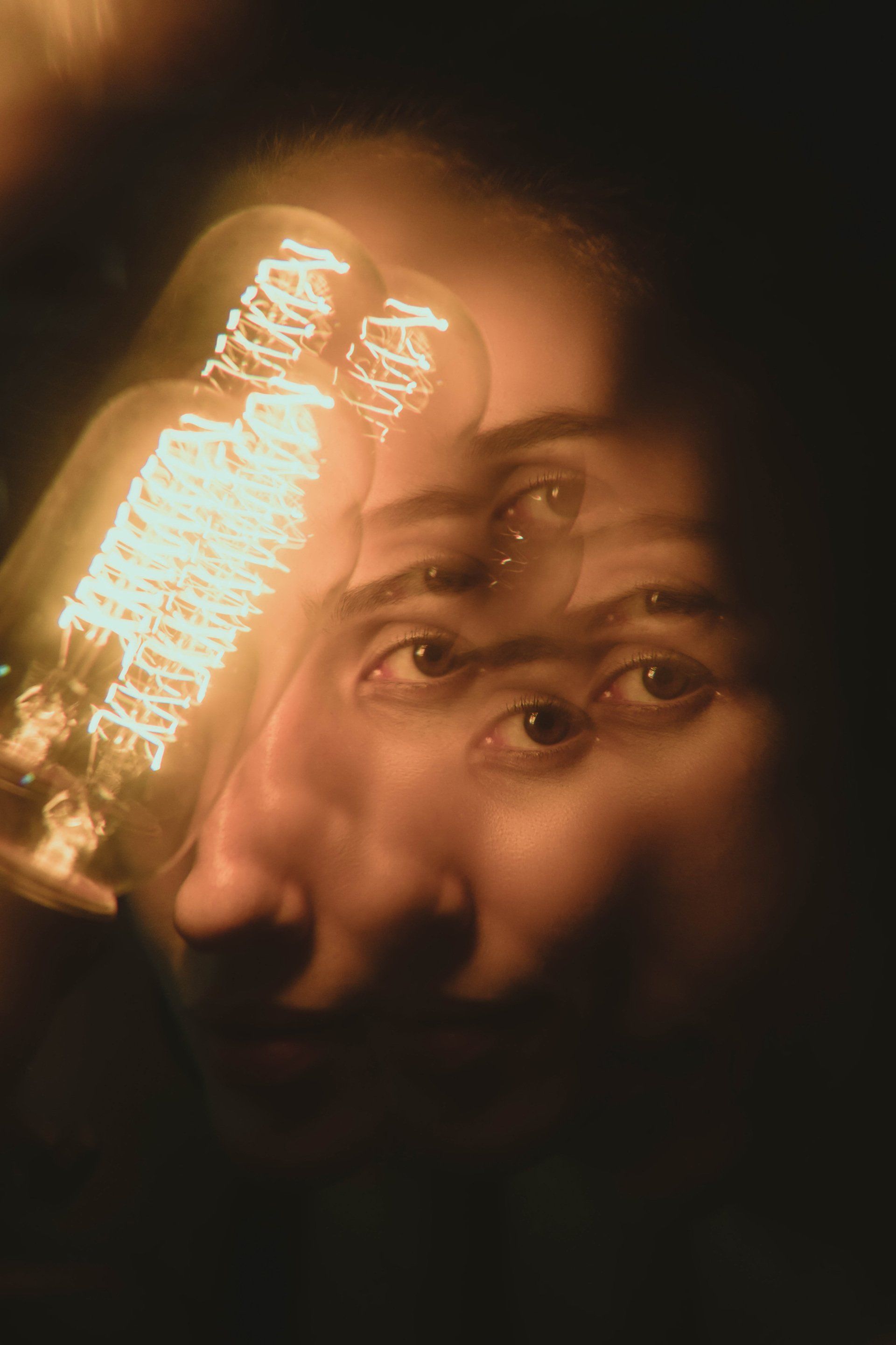 broken face with lightbulb
