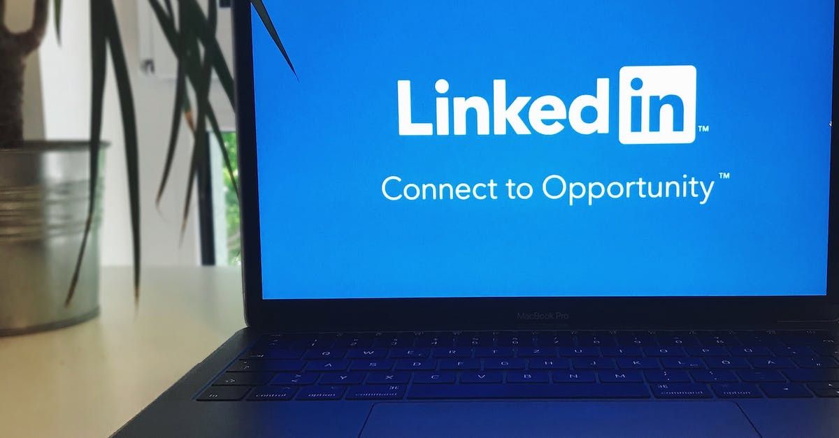 A laptop with the linkedin logo on the screen.