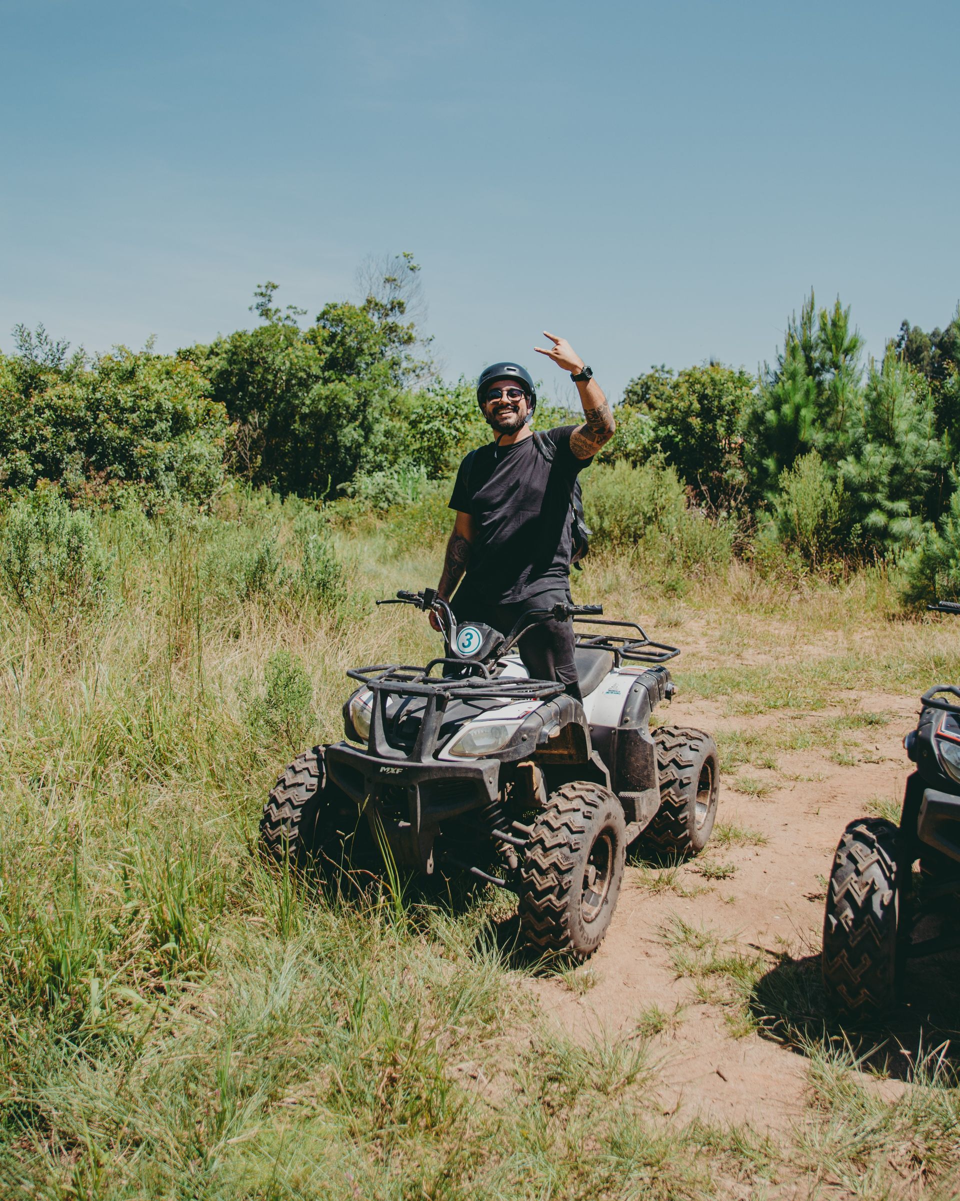 man riding ATV