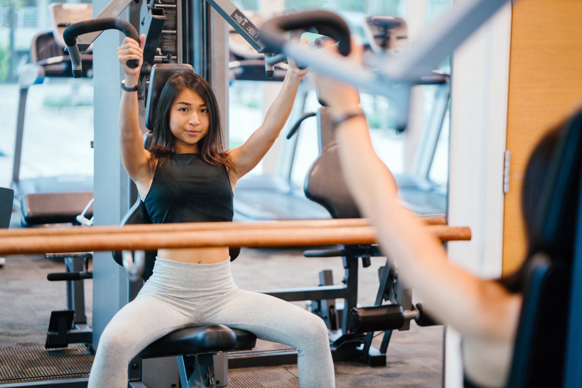 Fitness women with laptop and phone