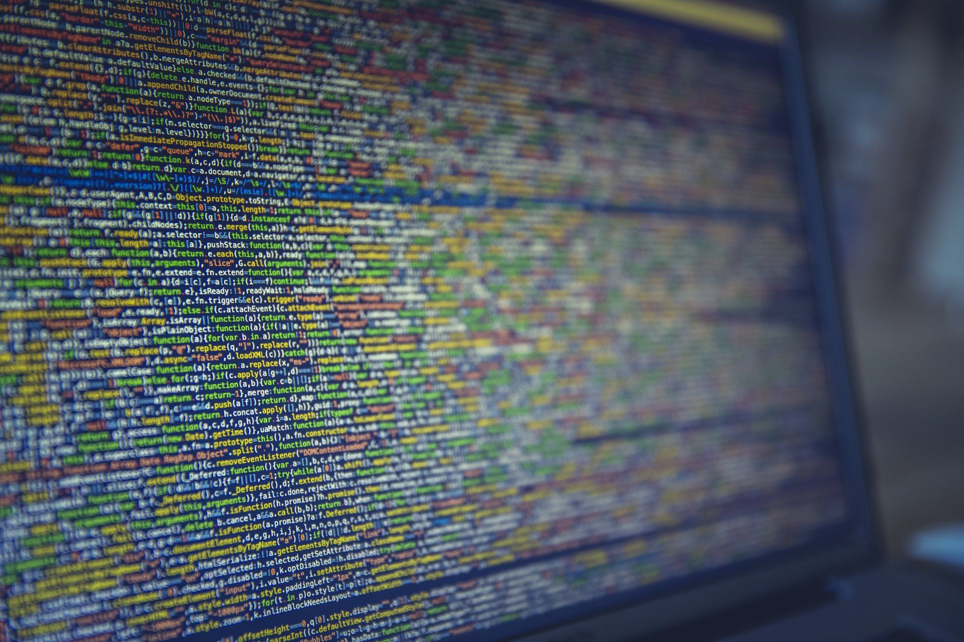 A computer screen with a lot of colorful lines of code on it