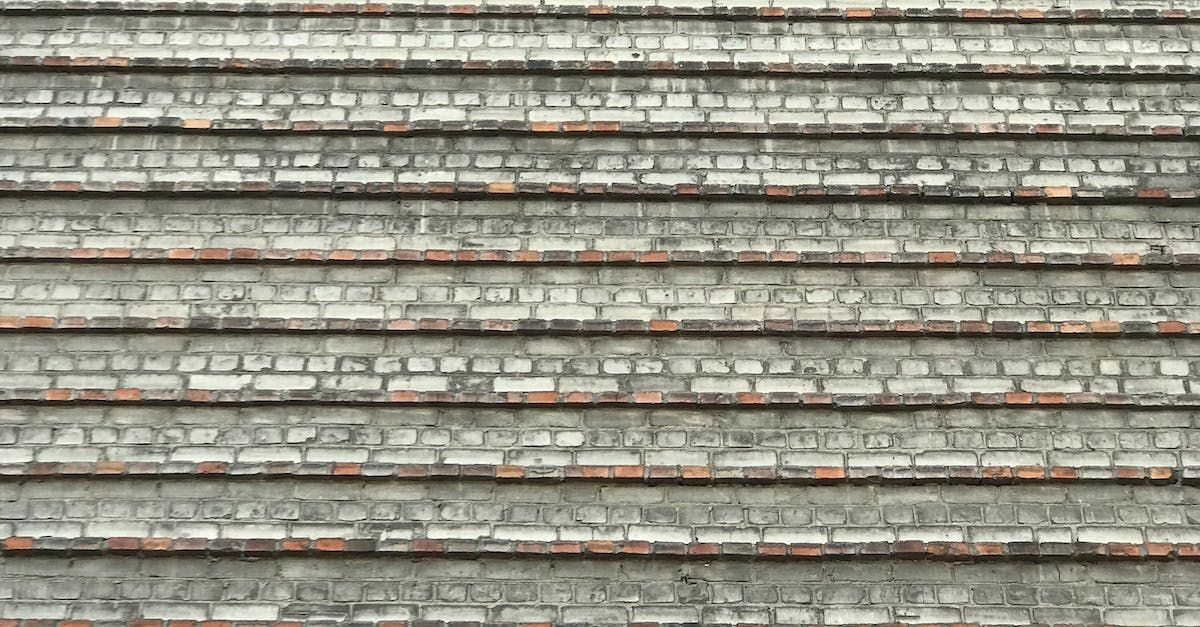 Older looking long steps with light tan and grey stones laid out