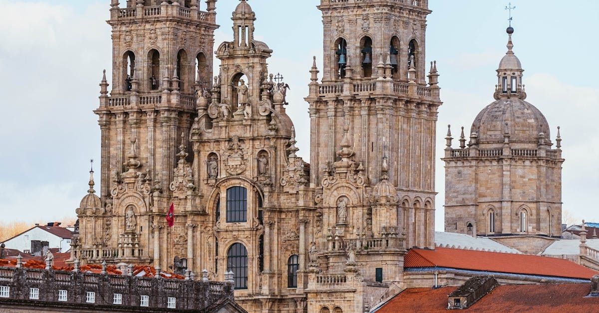 A large building with a lot of towers and a dome on top of it.