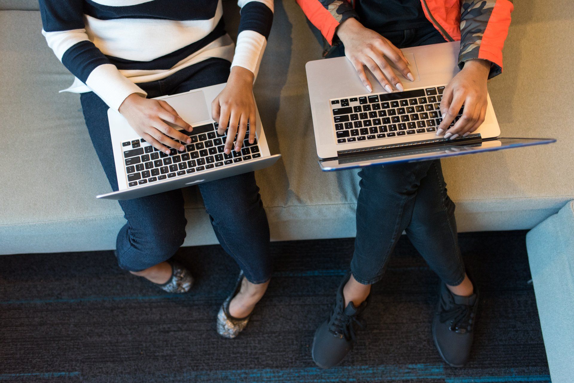 Two people working on laptops | Acorn to Oak Strategies SEO Web Design Knoxville