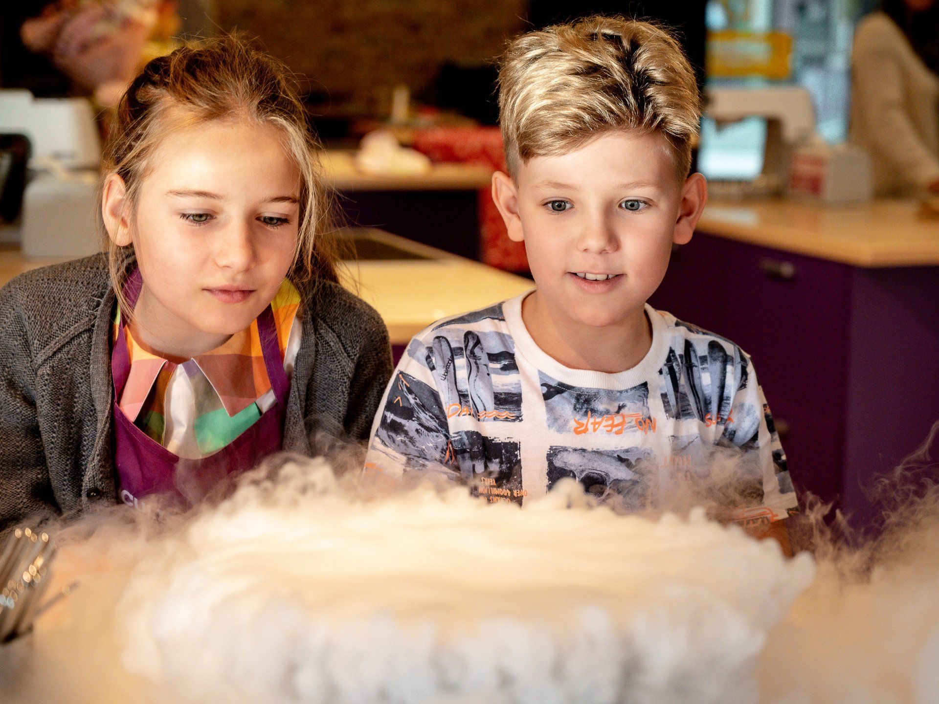 Unschooling Neurodivergent Children kids doing science experiment