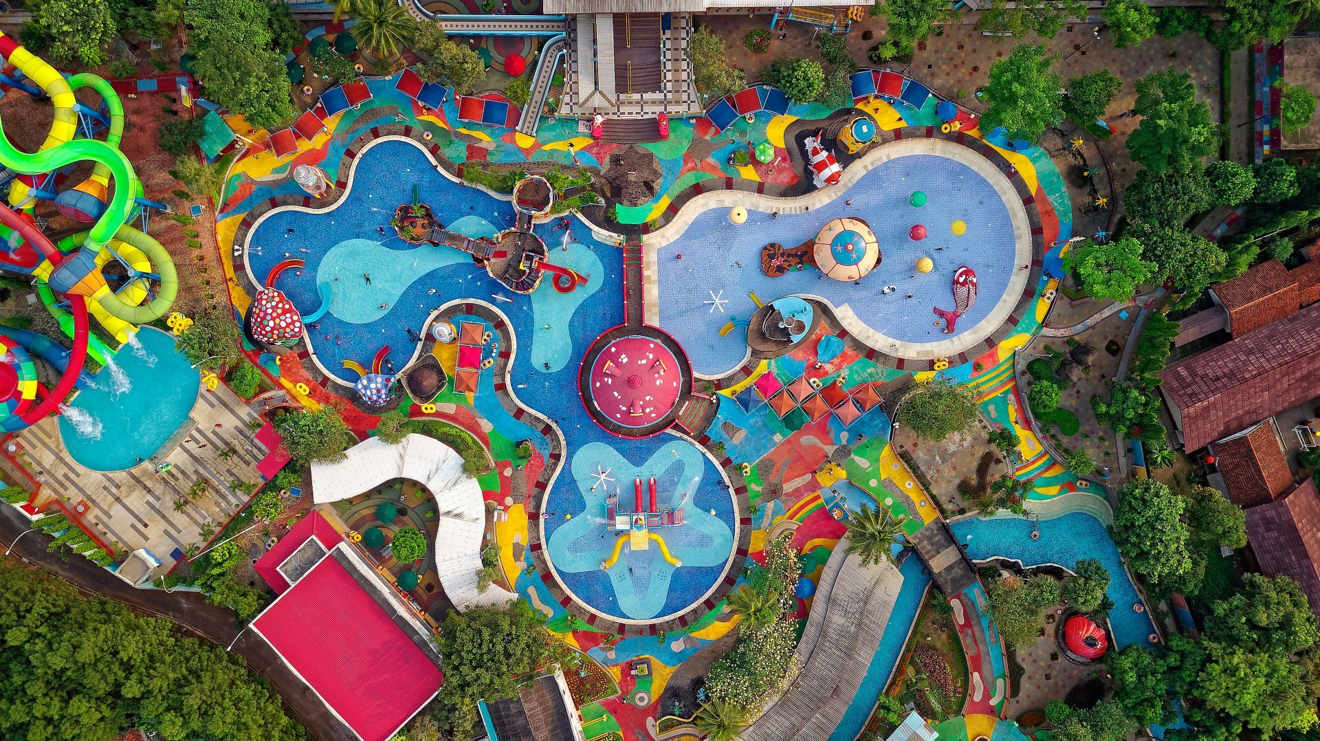 an aerial view of a colorful water park
