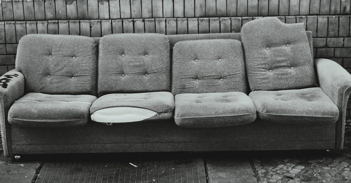 Stock photo of a couch ready for removal