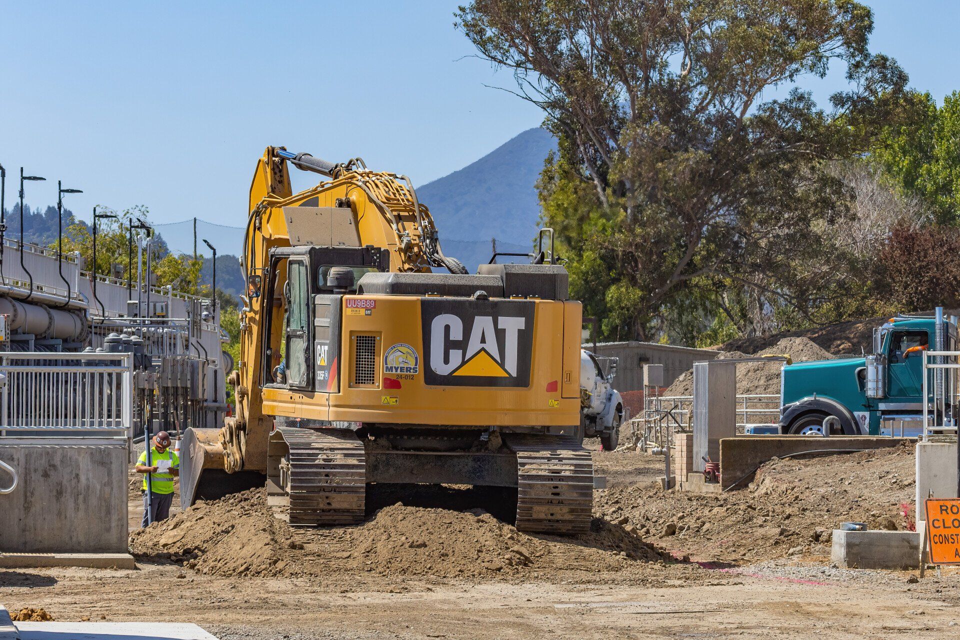 excavator sitting on a pile of dirt in Lancaster