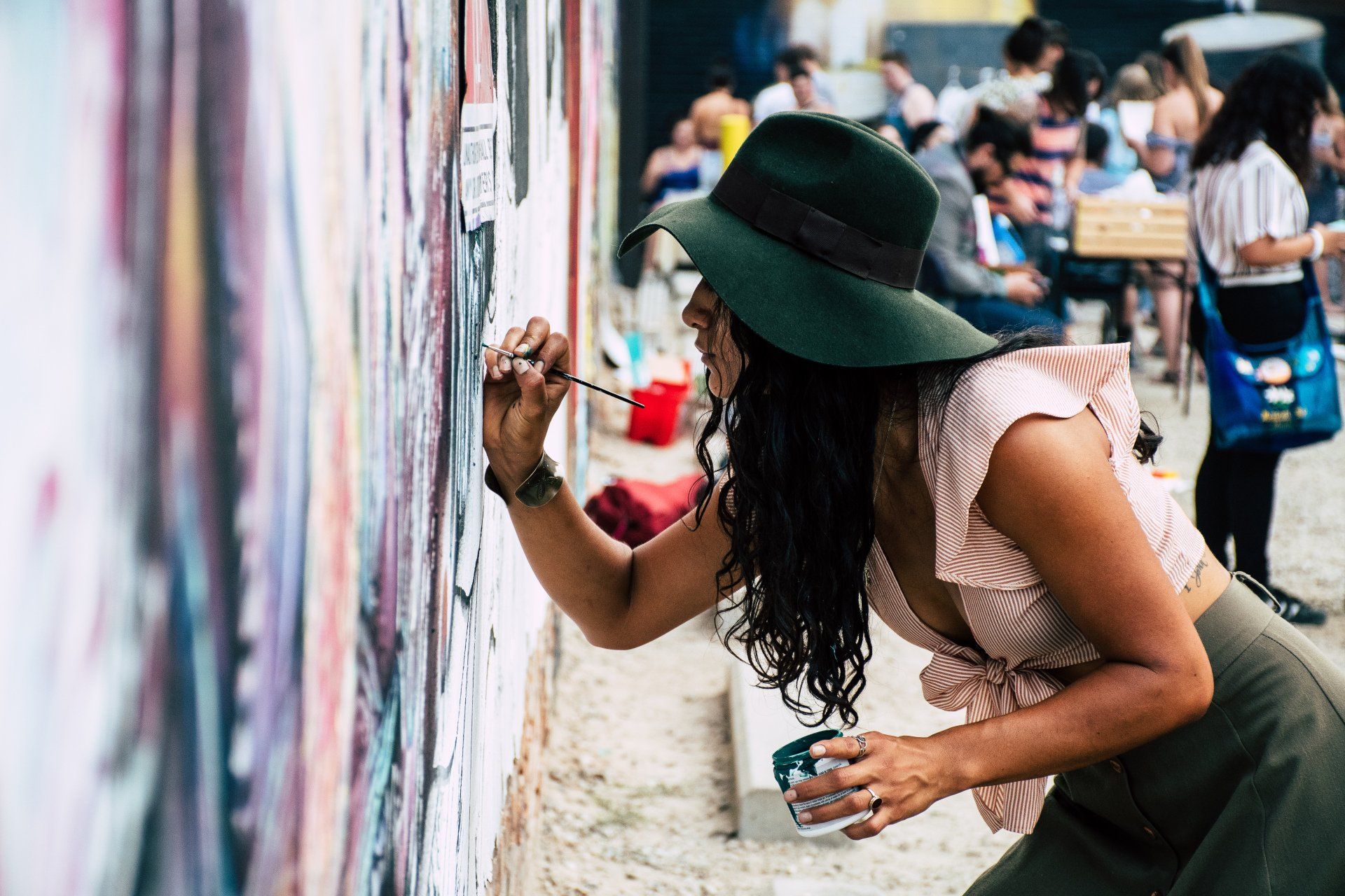 woman painting at Splatter Paint Action Art Studio