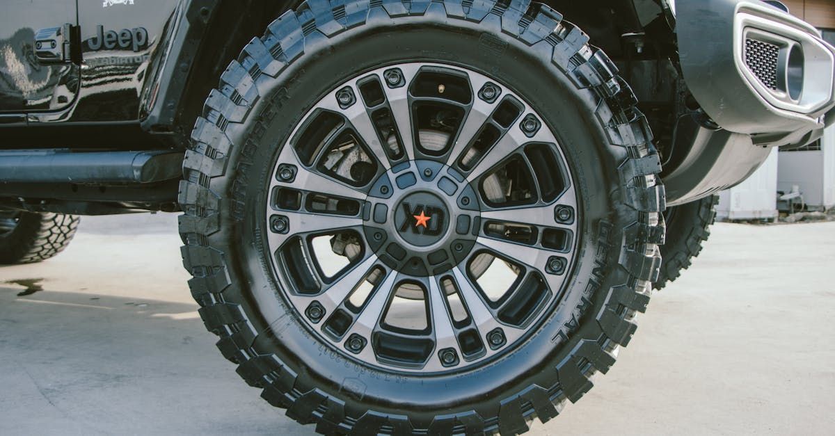 A close up of a jeep wheel with a star on it