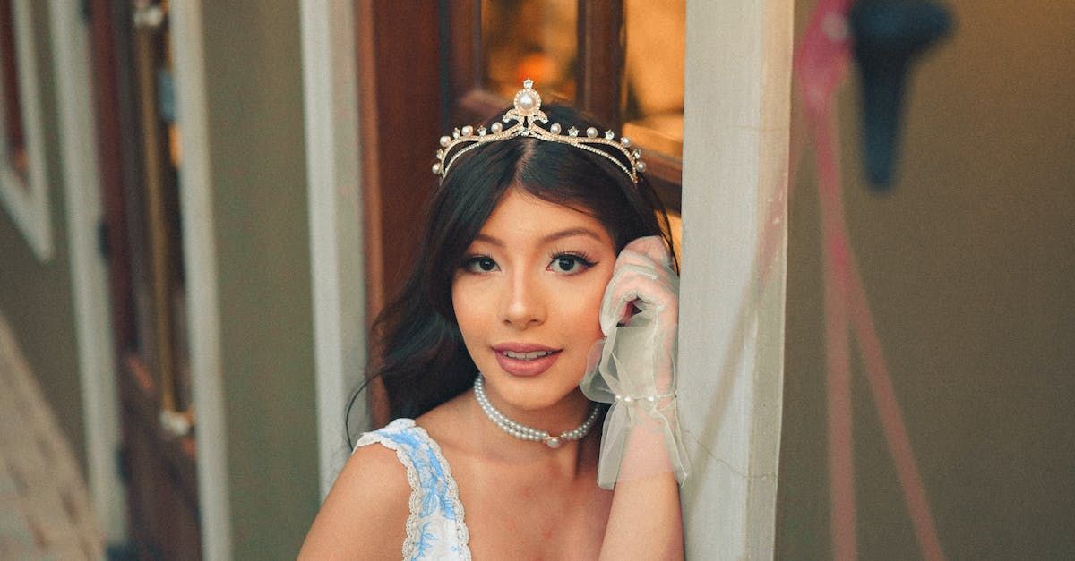 A Senior poses for a Prom Picture from Project 150's Prom Closet