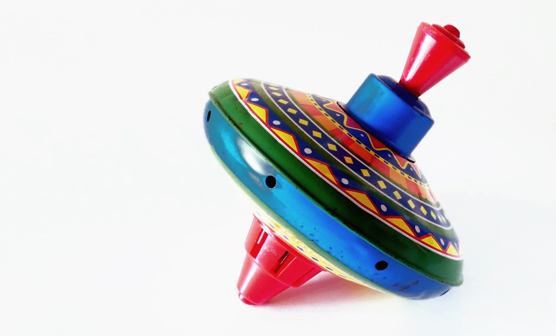 A toy Top on a white background.