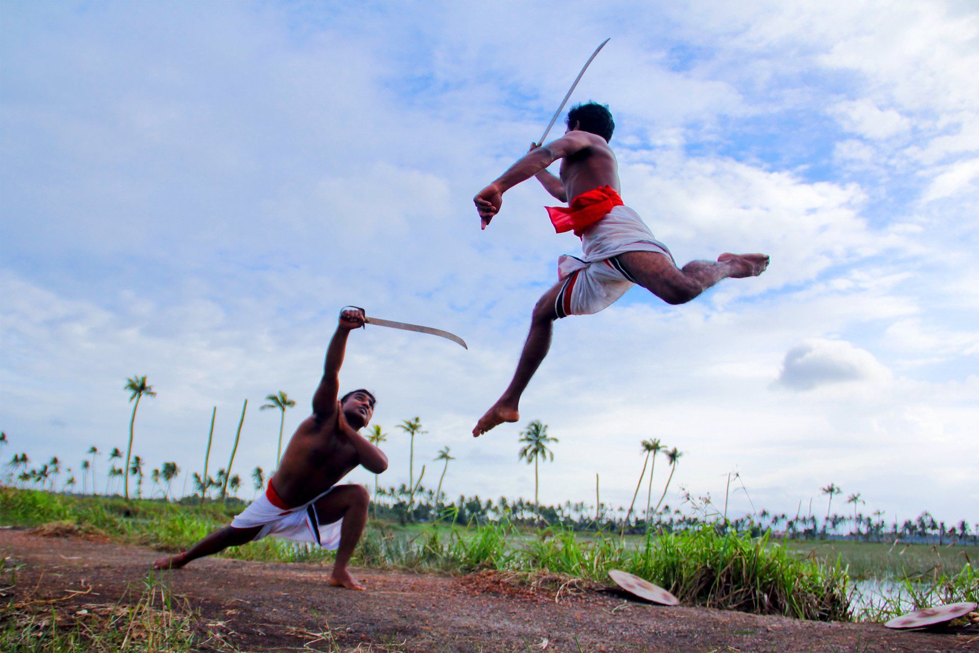 Two men practising Kalaripayattu, an ancient martial art of Kerala.
