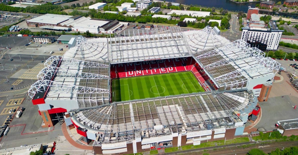 An aerial view of a soccer stadium in a city.