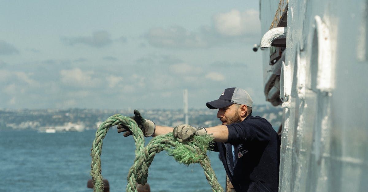A crewman working on a ship