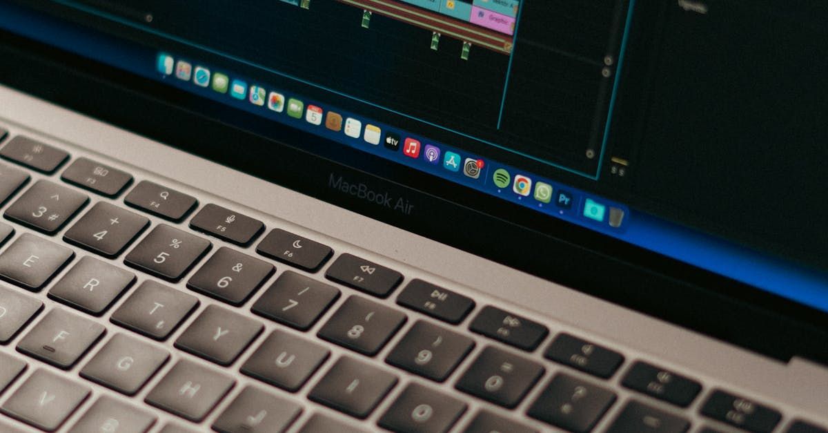 A close up of a laptop computer with a blue screen.