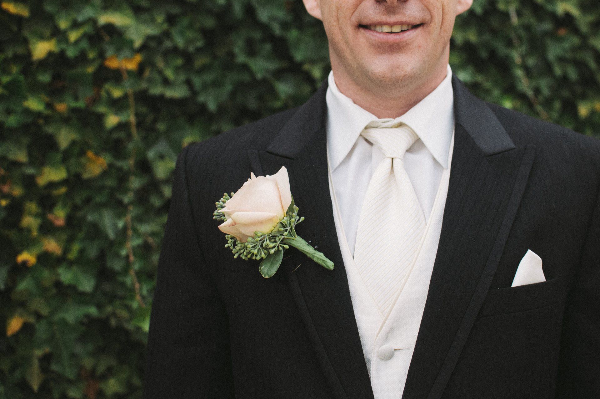 Tuxedo man leaning