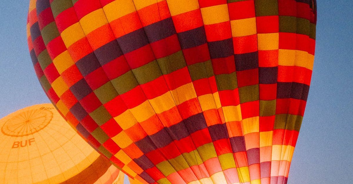 A colorful hot air balloon is flying in the sky.