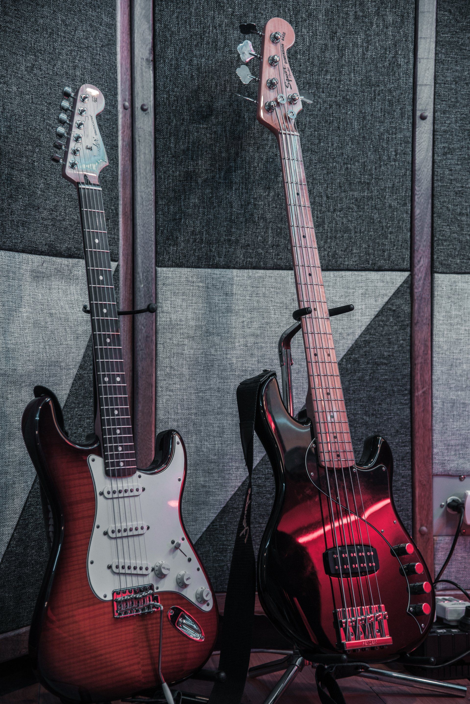 Background professional electronic guitar hero player strumming solo on stage in club, concert, music festival, new year party, air guitar competition