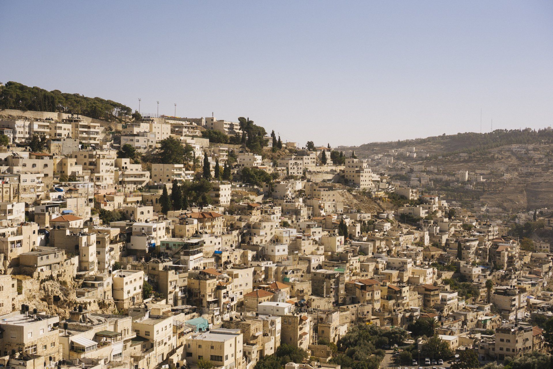 Wide view of the Mount of Olives with homes and neighborhoods stretching down the hillside in Jerusalem