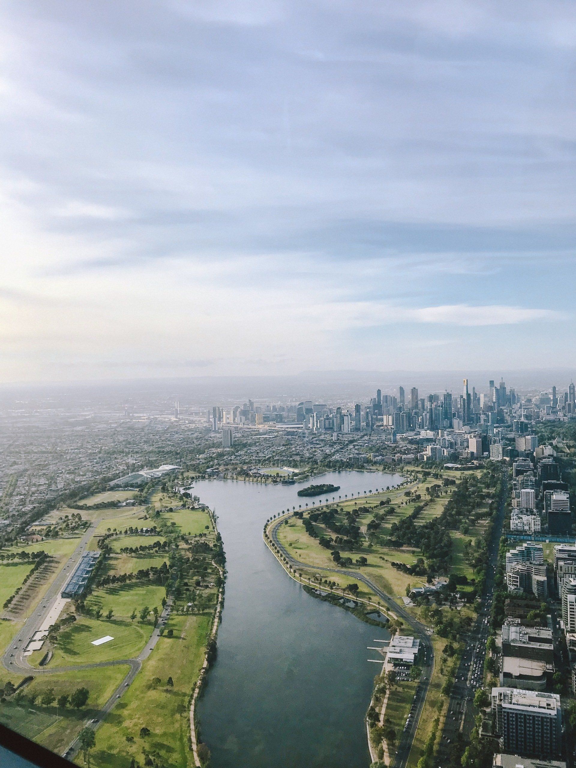 An aerial view of a city with a river running through it
