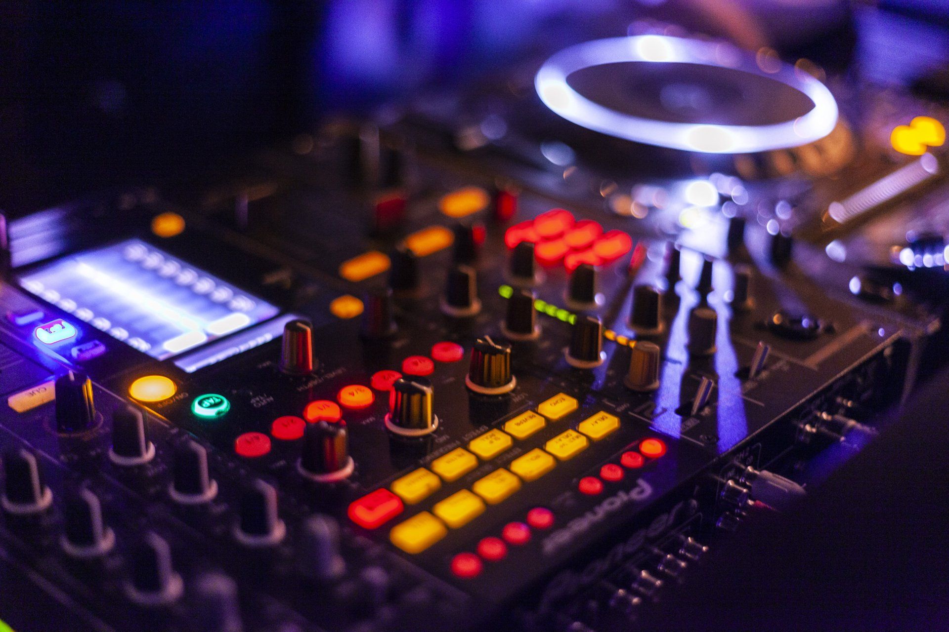Professional DJ Deck displaying led light clusters and platen