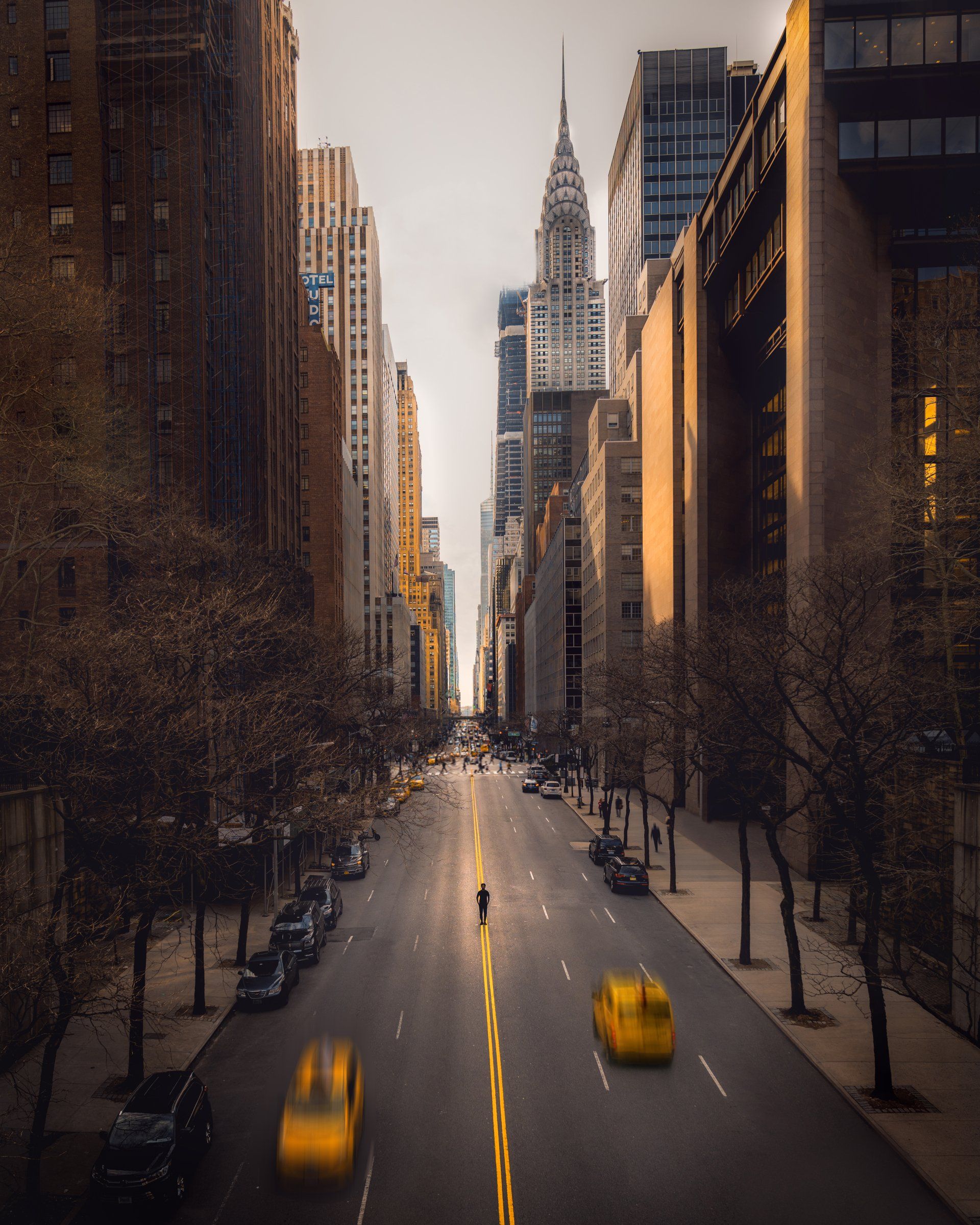 Manhattan city scene looking down cross street