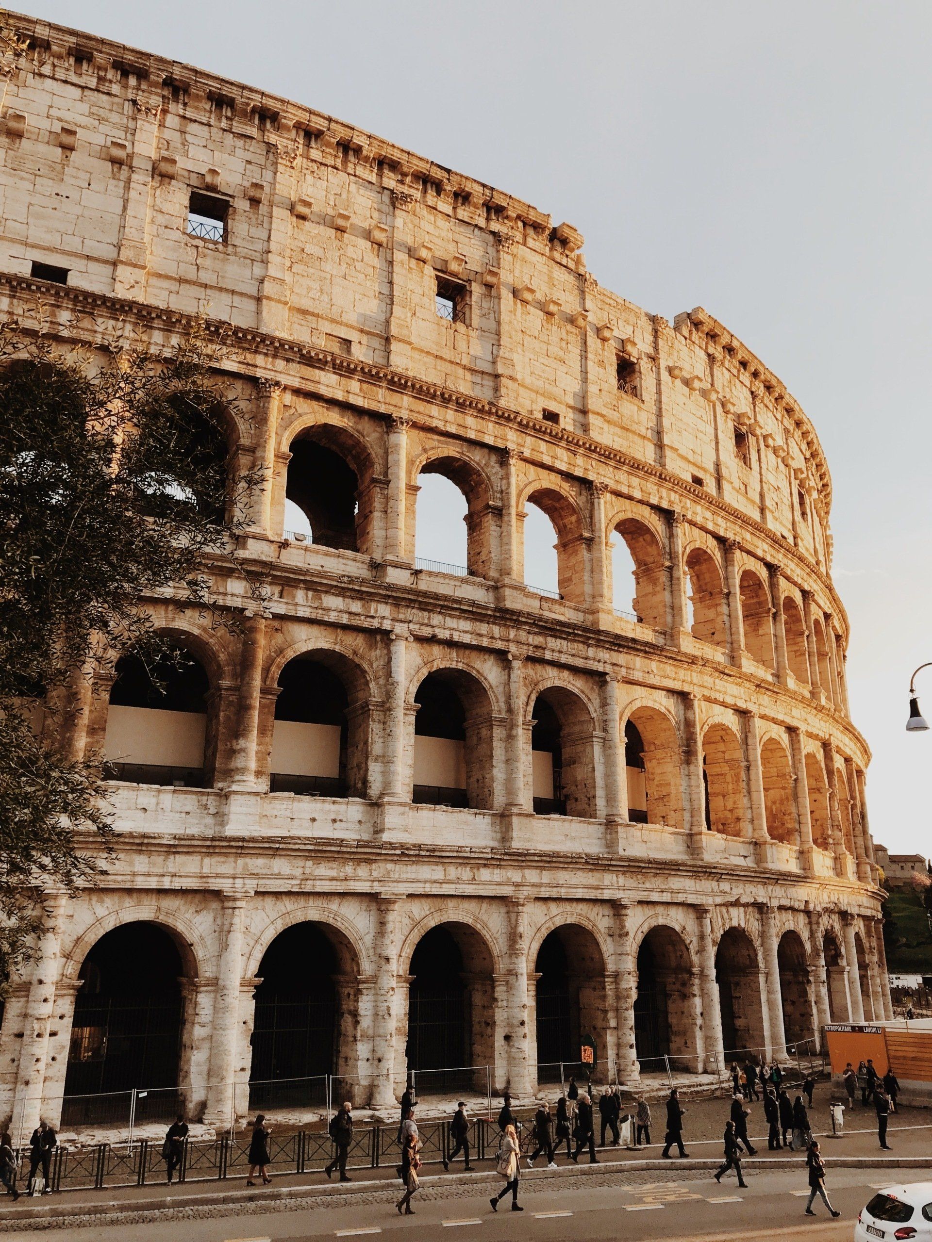 A view of the colosseum from a bridge in rome.