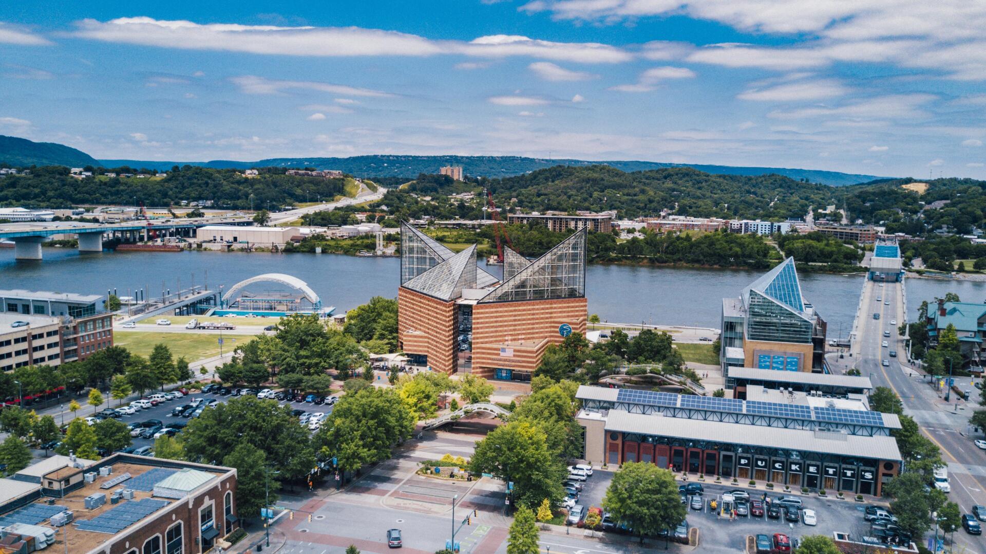 An aerial view of a city with a river in the background. The Reserve at Lakeshore, Chattanooga, TN.