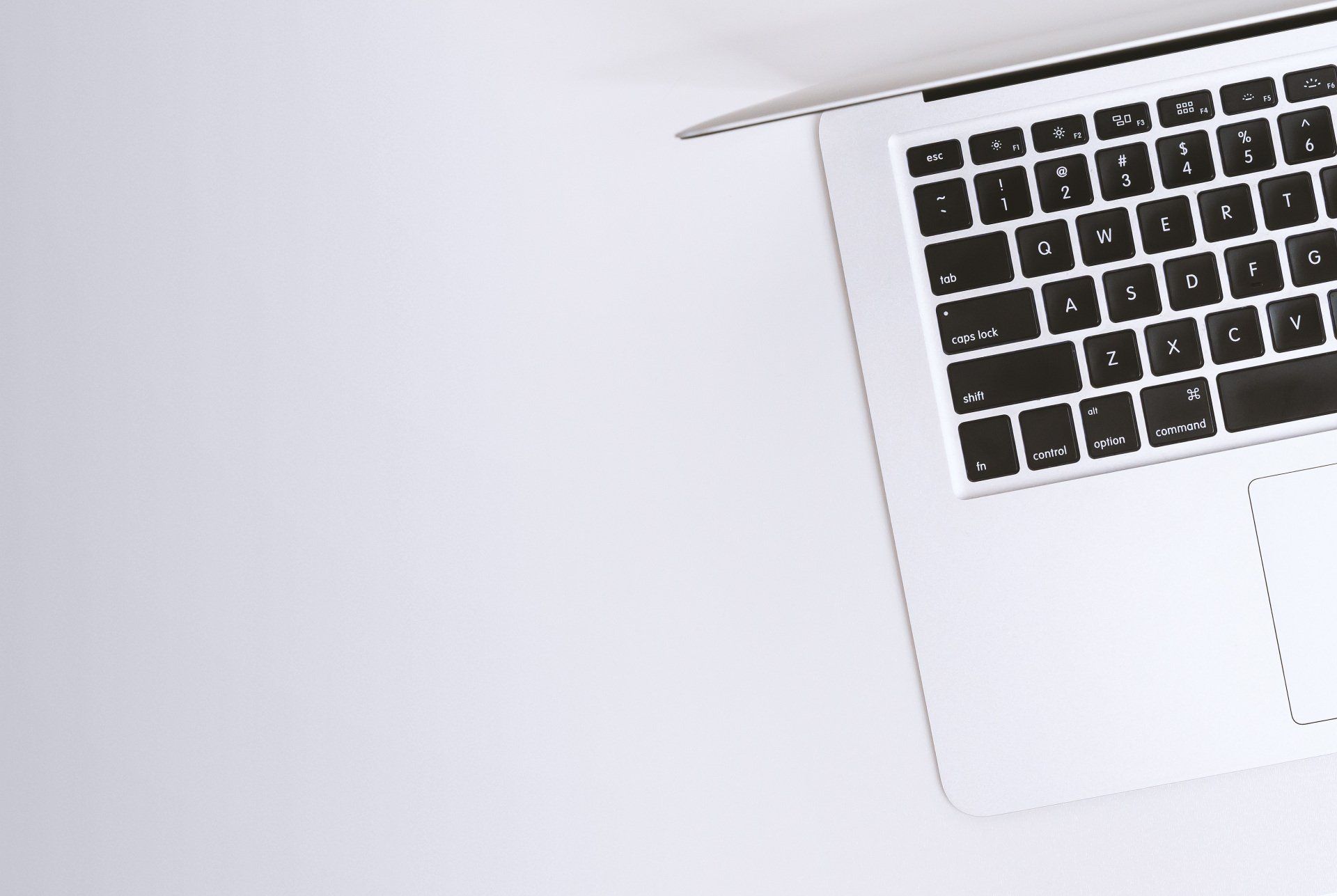 Photo of a laptop - click to access the online portal