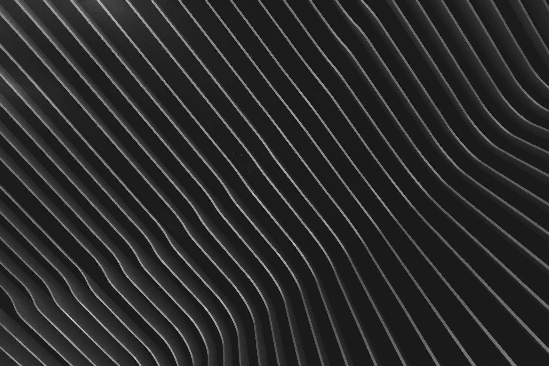 A close up of a black and white striped background.