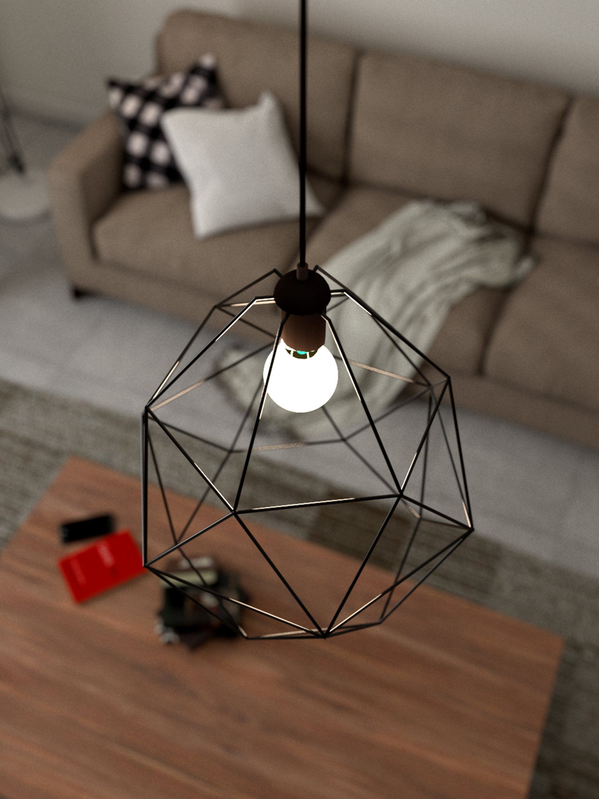 Overhead shot of a living room with a geometric pendant light. A brown sofa and coffee table are below.