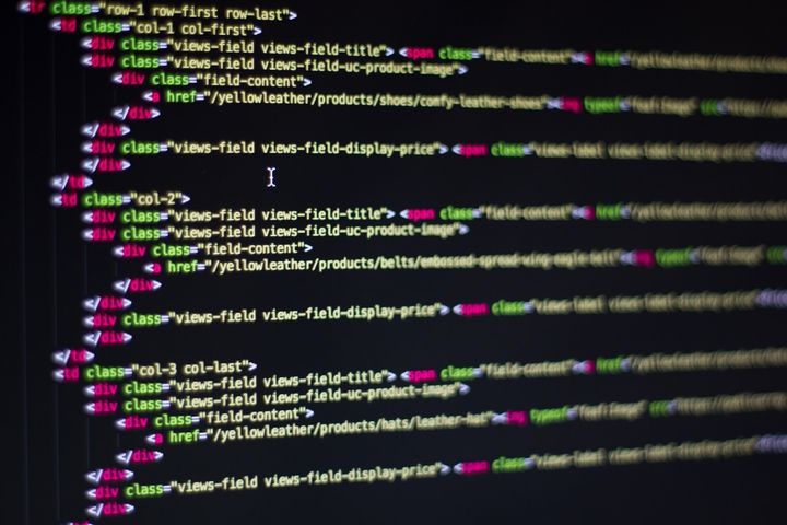 A computer screen with a lot of html code on it
